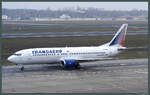 berlin-tegel-eddt/764985/die-737-400-ei-dnm-der-transaero-rollt Die 737-400 EI-DNM der Transaero rollt am 29.12.2008 zum Gate auf dem Flughafen Berlin-Tegel. 2015 stellte Transaero den Flugbetrieb aufgrund Überschuldung ein.
