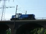 275 107 (92 80 1275 107-1 D-DPR), eine MAK G1206 der duisport rail bef�hrt am 04.08.2009 den Hochfelder Viadukt in Duisburg.