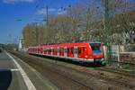 Auf �berf�hrungsfahrt, vermutlich in Richtung Krefeld zum dortigen Ausbesserungswerk, f�hrt 423 400 der S-Bahn Frankfurt durch K�ln-S�d.