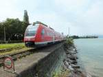 612 077 bef�hrt an bekannter Stelle am 24.7.13 den Bodenseedamm in Lindau.