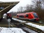 W�hrend 641 034 gerade aus Gro�heringen in S�mmerda ankommt, wartet 261 024 mit ihrem Zug schon auf die Freigabe der Strecke, 5.2.14