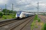 Ein RE7 von Krefeld nach Rheine, gebildet aus den TALENT-Triebwagen 9442 363 und 352 f�hrt am 08.07.21 in Opladen ein.