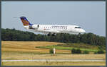 Die D-ACRL, eine CRJ-200ER der Eurowings, kurz vor dem Aufsetzen in Dresden am 19.08.2009.
